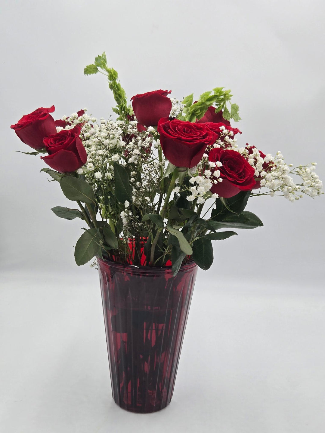 Dozen Red Roses in Tall Red Glass Vase