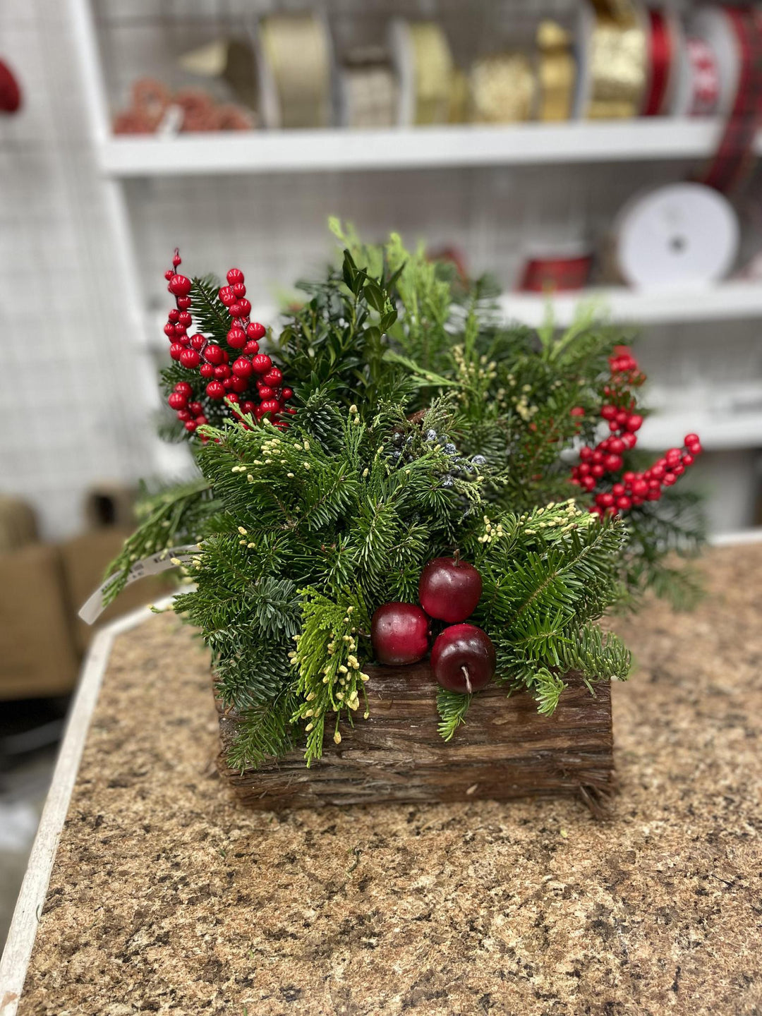 Small Standard Pine Log with Greens and Bow Centerpiece